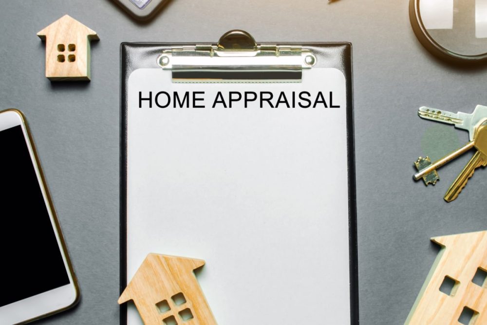 Clipboard with 'Home Appraisal' written and various house related objects.